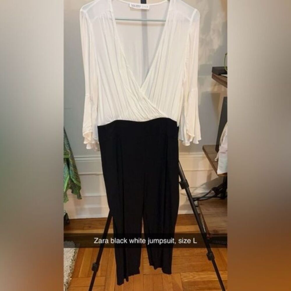 Zara black and white jumpsuit with flutter sleeves detail